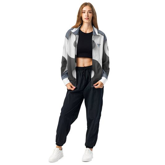 White Jacket with Black and white yin yang all over with Empathic Soul Apparel Logo on Left chest. Jacket Open on female model